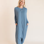 Model wearing a blue sleeveless adult sleep sack that has pockets with matching PJ underneath ::: Model is 5'9" wearing size S/M ///