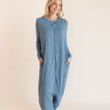 Model wearing a blue sleeveless adult sleep sack that has pockets with matching PJ underneath ::: Model is 5'9" wearing size S/M ///