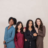 Group of women modeling the Kyte Sleep Shirt in Atlantic, Burgundy, Midnight and Espresso 