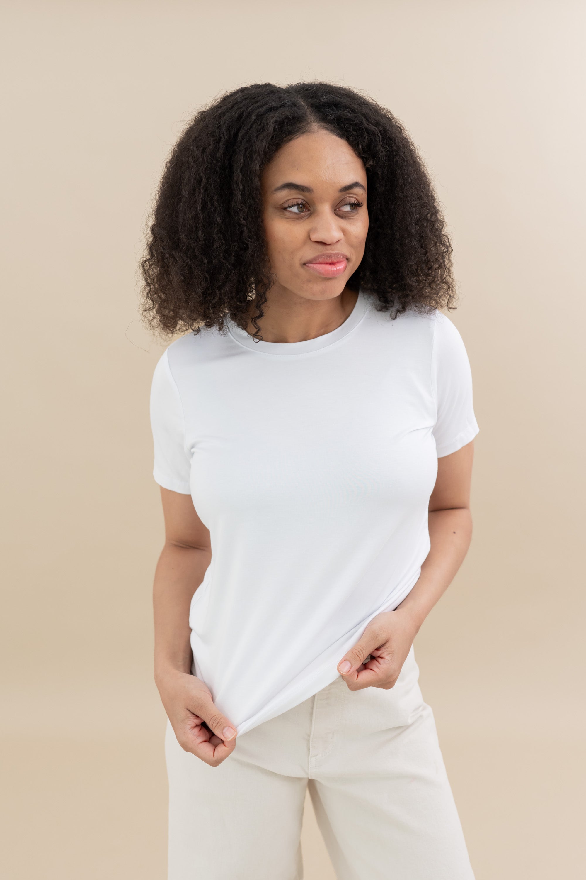 Female wearing the Women's Crew Neck Tee in Snow