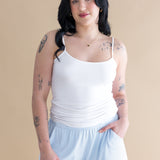 Woman wearing white tank and blue lounge shorts ::: Model is 5'6" wearing size M ///