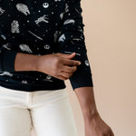 Close up of the black wrist cuff on the Women's Sweatshirt in STAR WARS™