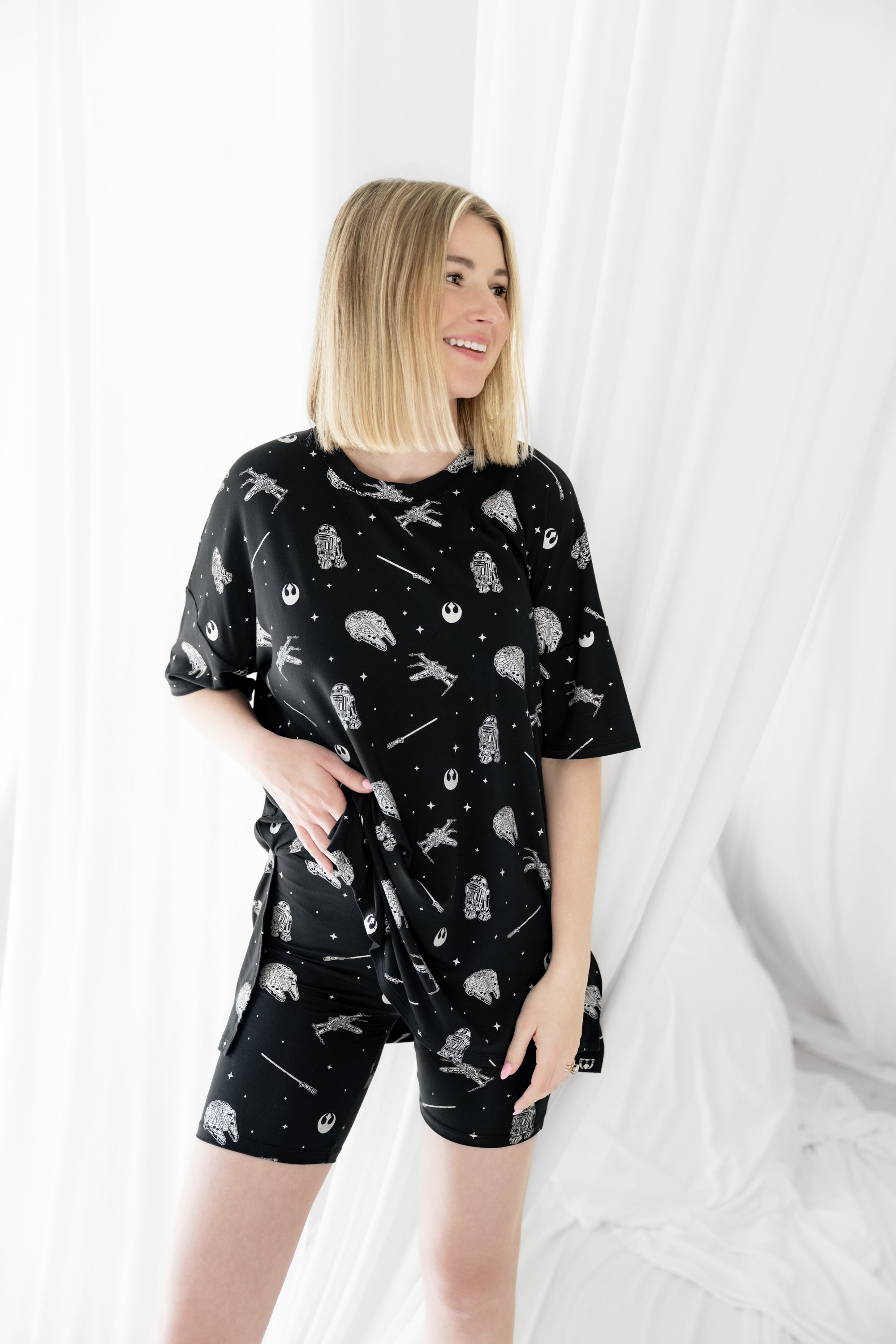 Female modeling the Women’s Biker Short Set in STAR WARS™ in front of a white background