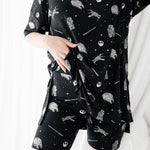 Female modeling the Women’s Biker Short Set in STAR WARS™ showing the waistband on the shorts