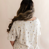 Back side of Women's Relaxed Fit V-Neck in Starry Icon while on a model 