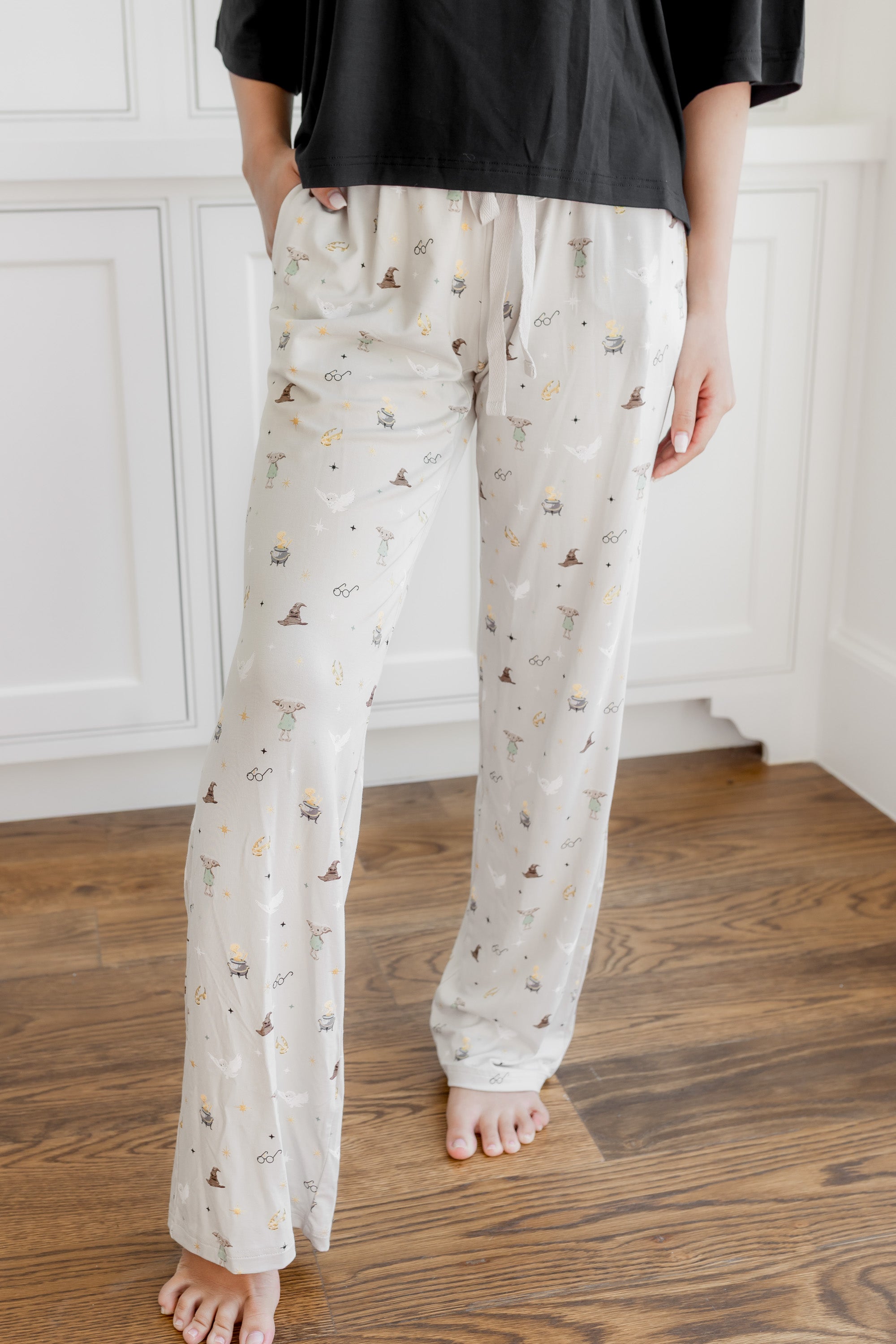 Close up of model wearing the Women's Lounge Pants in Starry Icon paired with Short Sleeve Tee in Midnight 

::: Model is 5'2" wearing size S ///