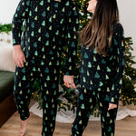 Male and female models wearing matching  Jogger Pajama Sets in Twinkle Tree