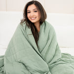 Model wrapped in Bamboo Blanket in Thyme 2.5
