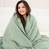 Model wrapped in Bamboo Blanket in Thyme 2.5