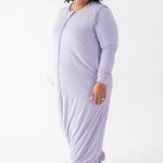 Female model wearing the Adult Sleep Bag Walker in Taro