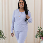 Model wearing the Women's Ribbed Henley Top in Taro