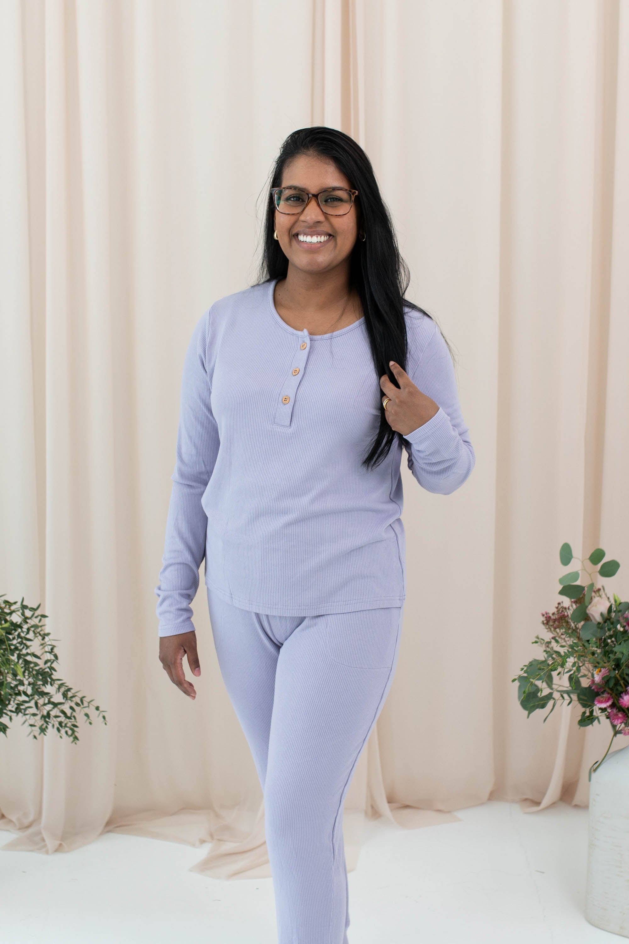 Model wearing the Women's Ribbed Henley Top in Taro