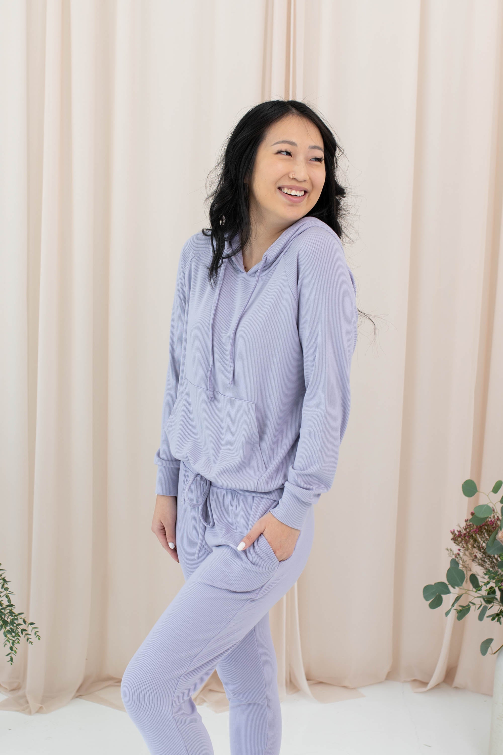 Female modeling the Women's Ribbed Hoodie in Taro and Taro Jogger Pants