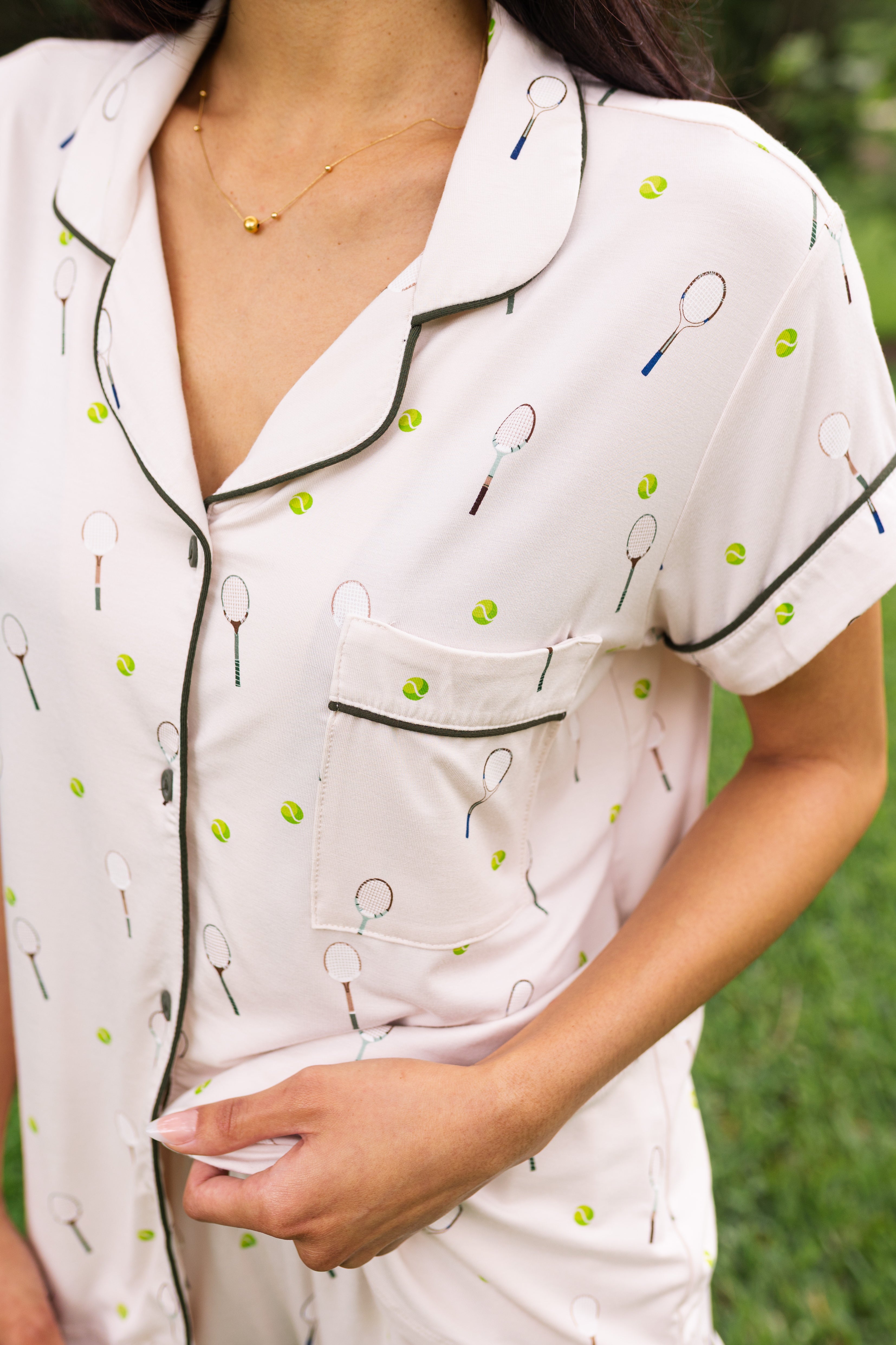 Close up of the top from the Women's Short Sleeve Pajama Set in Tennis while on a model ---PJ 2