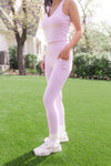 Female modeling the Bamboo Flex Women’s Leggings in Thistle with one hand in the side pocket of the leggings

::: Model is 5'2" wearing size XS ///