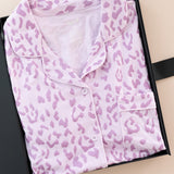 Long-Sleeved Women's Pajama Set in Thistle Leopard print packed in a box on a beige background