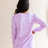 Back side of Women's Jogger pajama set in Thistle Leopard print on a beige background