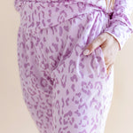Women's Jogger pajama set pant with pockets in Thistle Leopard print on a beige background