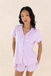 Close up of the model wearing the Bamboo Women's Short Sleeve Pajama Set in Thistle  ::: Model is 5'6" wearing size XS ///