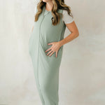 Female model wearing the Adult Sleep Bag Walker in Thyme