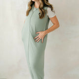 Female model wearing the Adult Sleep Bag Walker in Thyme