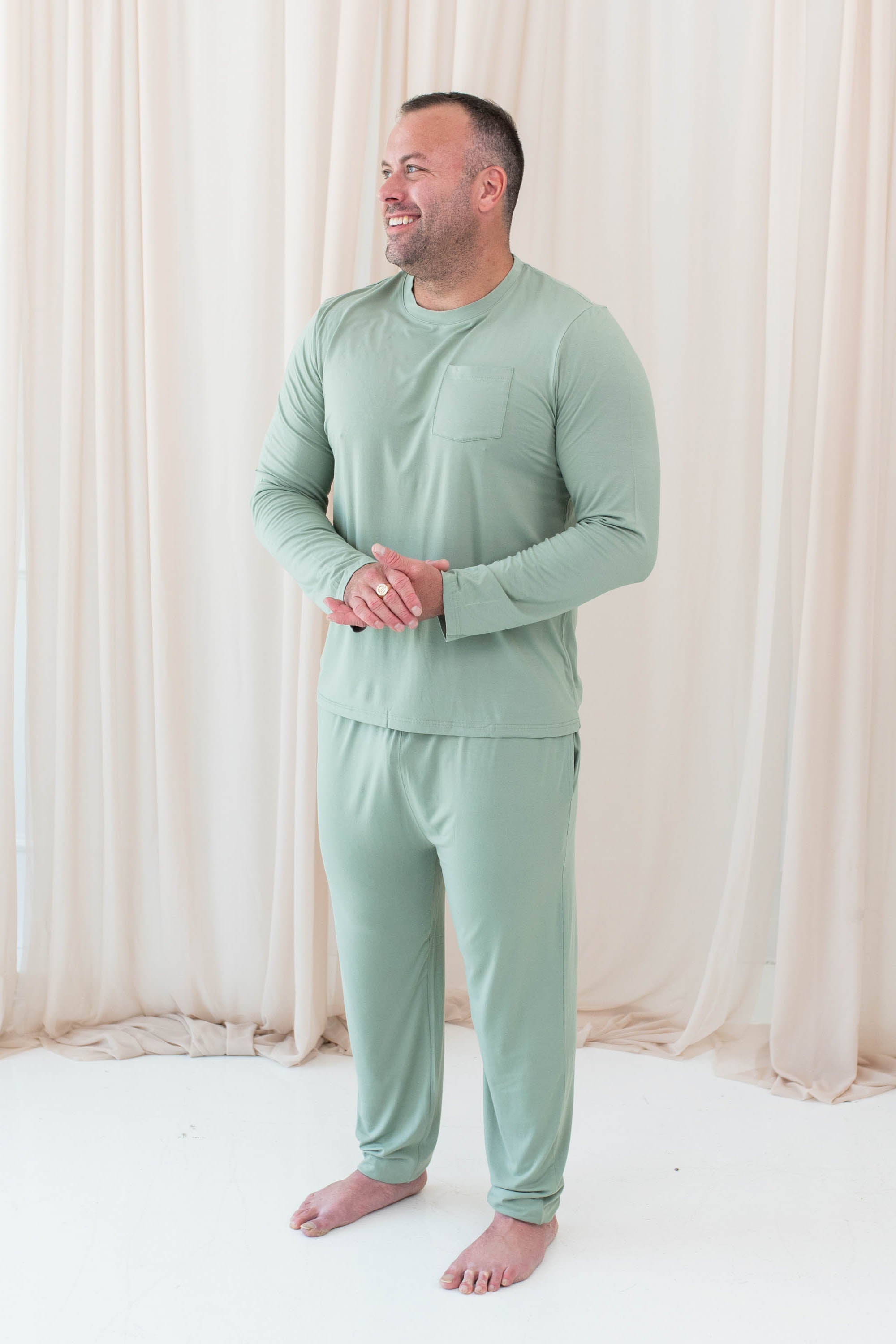Male model wearing the Men's Jogger Set in Thyme