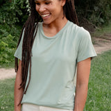 Female model wearing the Women's Crew Neck Tee in Thyme