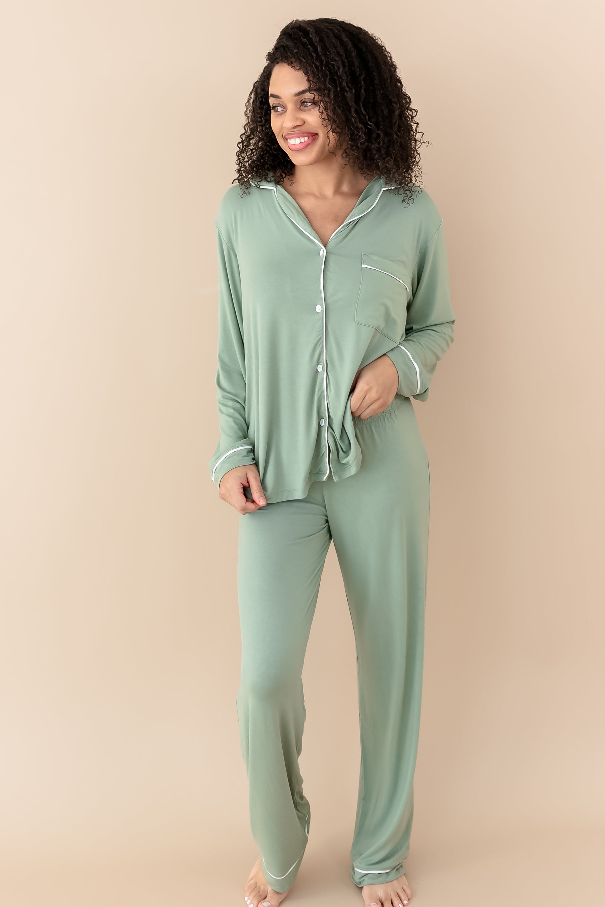 Female modeling Women's Long Sleeve Pajama Set in Thyme with Cloud Trim