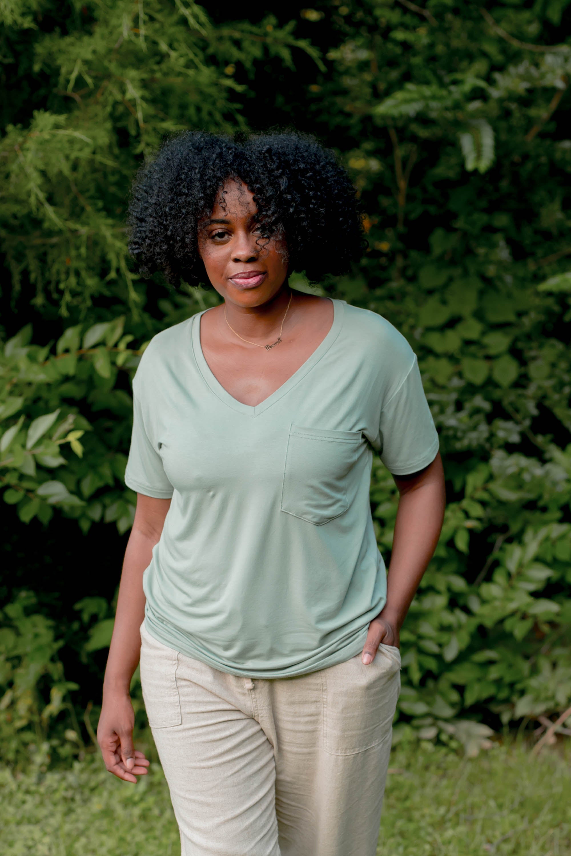 Model wearing the Women’s Relaxed Fit V-Neck in Thyme