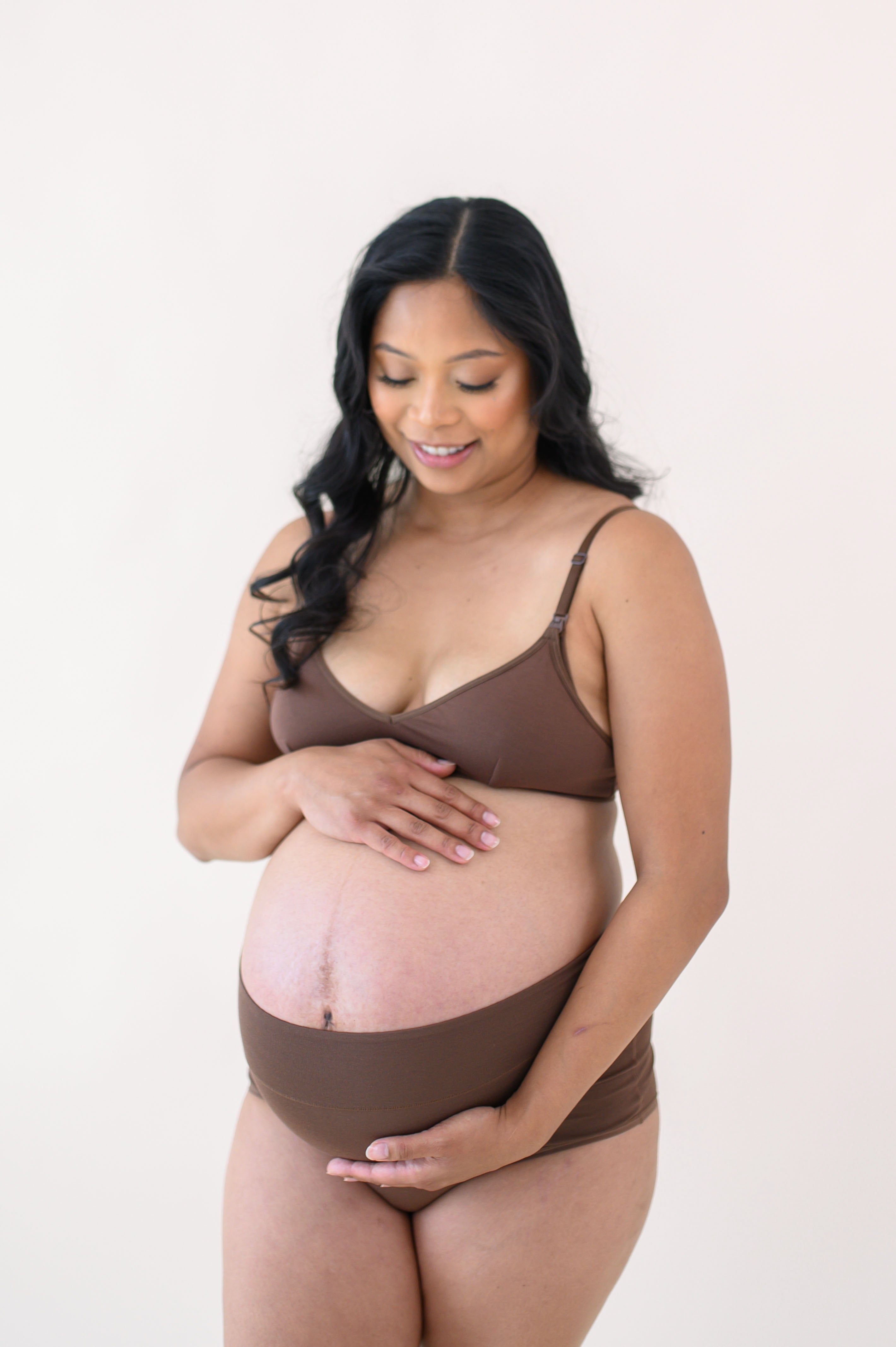 Woman modeling Women's High-Waisted Brief in Toffee and nursing bra