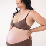 Woman modeling Women's High-Waisted Brief in Toffee and nursing bra