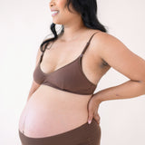 Woman modeling Women's High-Waisted Brief in Toffee and nursing bra