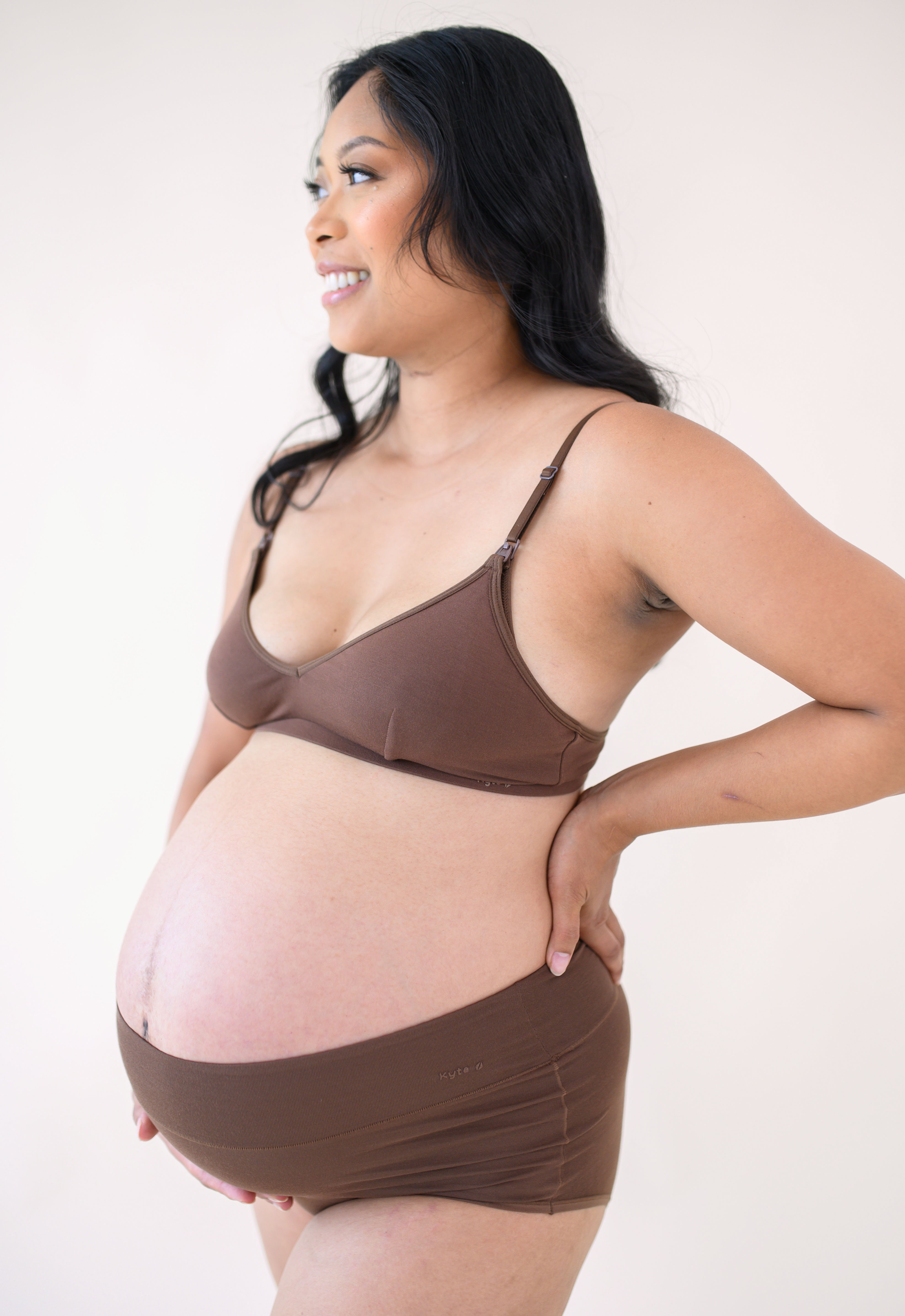 Woman modeling Women's High-Waisted Brief in Toffee and nursing bra