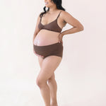 Woman modeling Women's High-Waisted Brief in Toffee and nursing bra