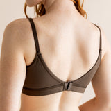 Model show casing the back side and straps on the Women's Pumping Bra in Toffee
