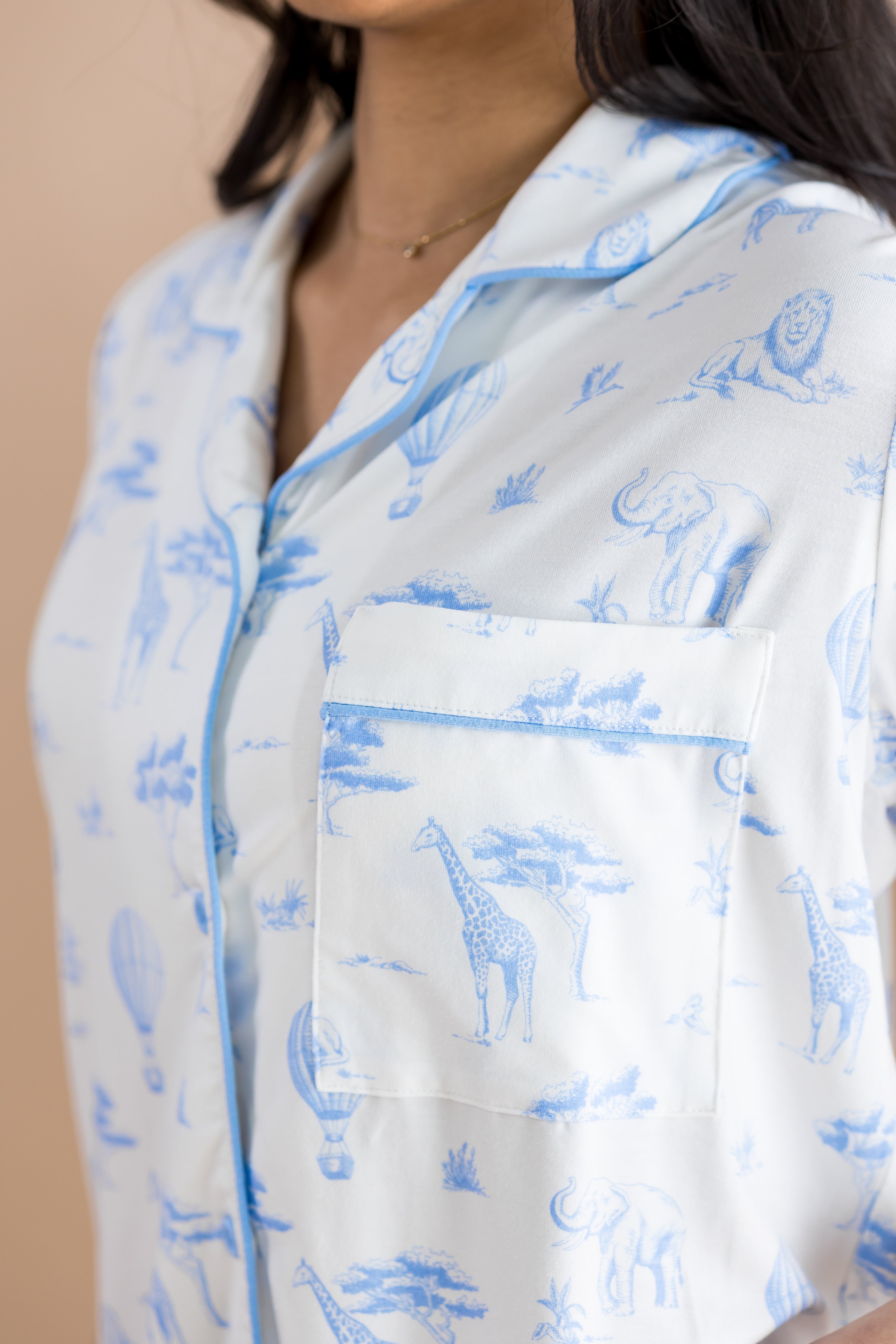 Close up of the pocket and lining in the top of the Bamboo Women's Short Sleeve Pajama Set in Toile Safari