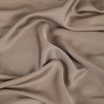 Close up of the Bamboo Sateen Sheet Set in Truffle fabric