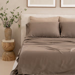 Bamboo Sateen Sheet Set in Truffle shown on a bed 