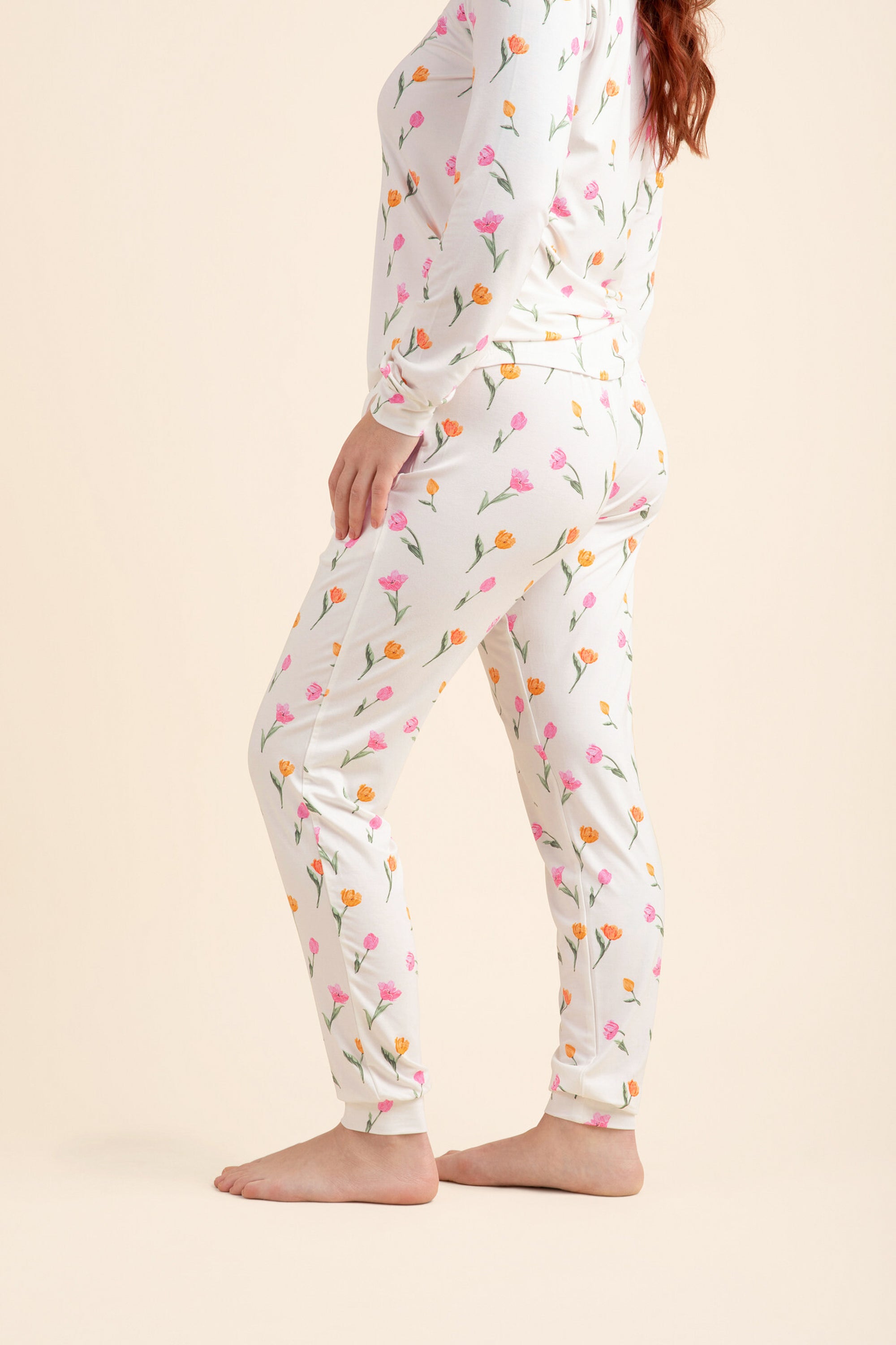 A female modeling the back of the Women's Jogger Pajama Set in Tulip