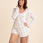 Female model posing wearing the Women's Lounge Robe in Tulip left open wearing the matching women's tank set
