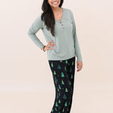 Woman with hand on her hip while modeling the Kyte Women's Lounge Pants in Twinkle Tree