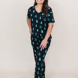 Model wearing the Women's Relaxed Fit V-Neck in Twinkle Tree paired with matching lounge pants