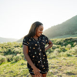 Woman modeling Women's Short Sleeve Pajama Set in Under the Stars in Yellowstone National Park
