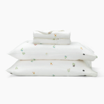 Stack of the Kyte Sateen Sheet Set in Wildflower