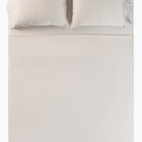 Overhead photo of the Bamboo Sateen Sheet Set in Sand Stone on a bed