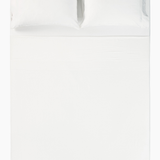 Overhead photo of the Bamboo Sateen Sheet Set in Shell on a bed