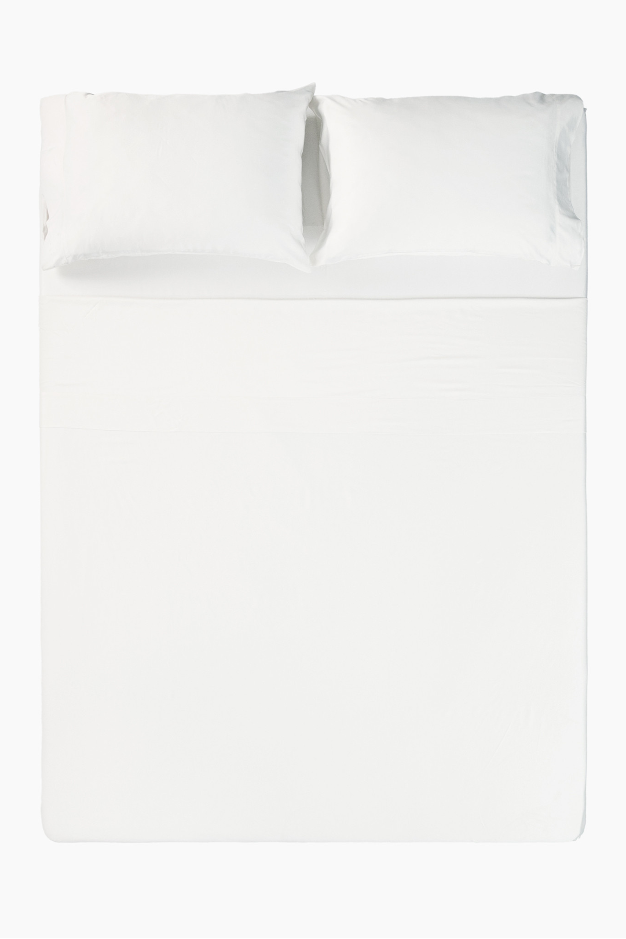 Overhead photo of the Bamboo Sateen Sheet Set in Shell on a bed