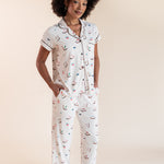 Model wearing Women's Short Sleeve Cropped Pajama Set in Vanilla Mahjong print with pockets on a beige background
::: Model is 5'9"" wearing size S ///
---PJ 4