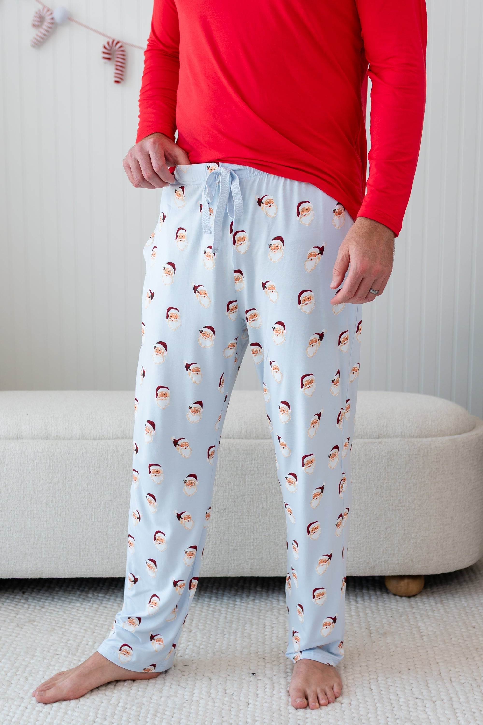 Men's Lounge Pants in Vintage Santa shown on a male model