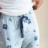Modal showcasing the drawstring on Men's Lounge Pants in Vintage Hockey print on a beige background
